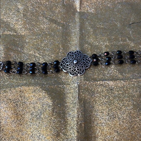 Sterling silver bracelet with silver designs each decorated with black beads. - Picture 2 of 6